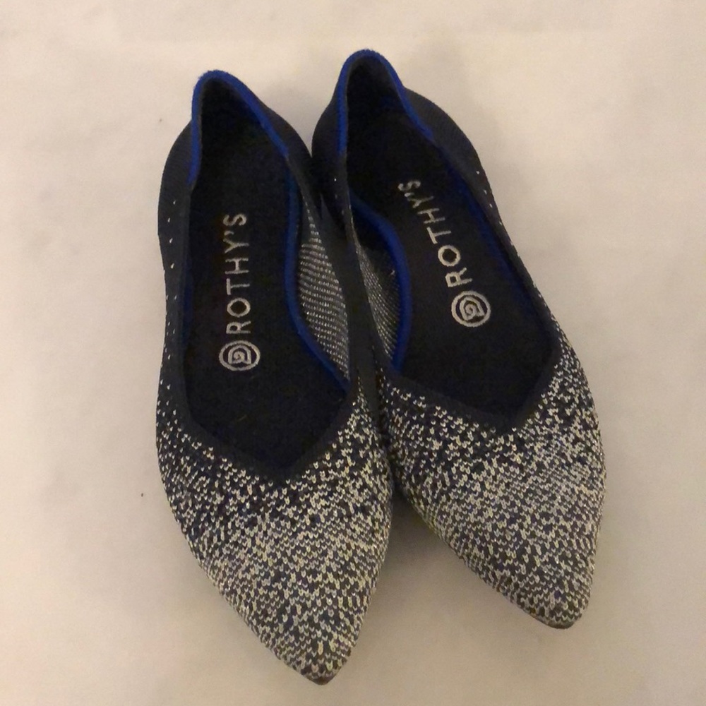 Rothy’s navy and silver point toe flat